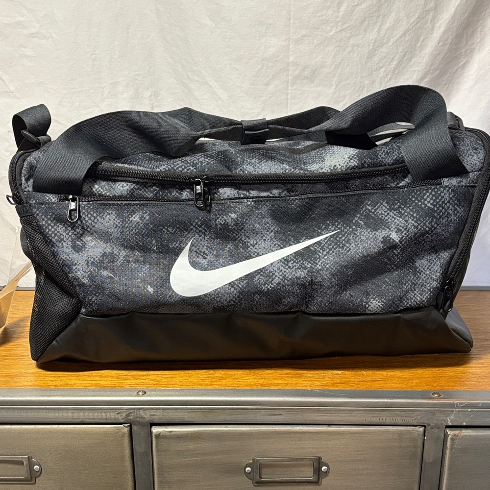 Nike Gray and Black Men's Brasilia Camo Duffel Bag perfect for bag to school.